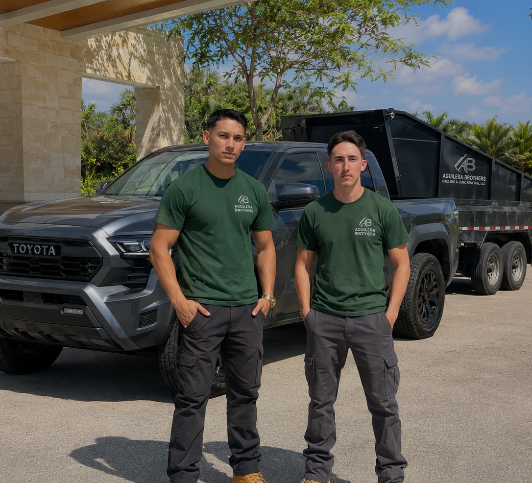 Daniel and Jorge Luis Aguilera in front of their hauling truck